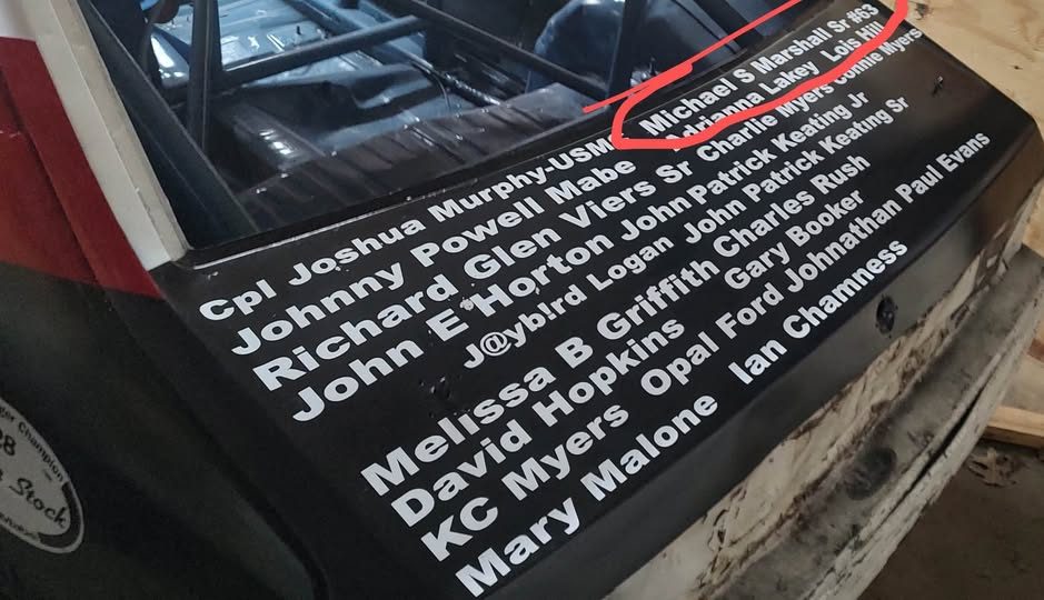 Names of family and supporters lettered across the rear deck